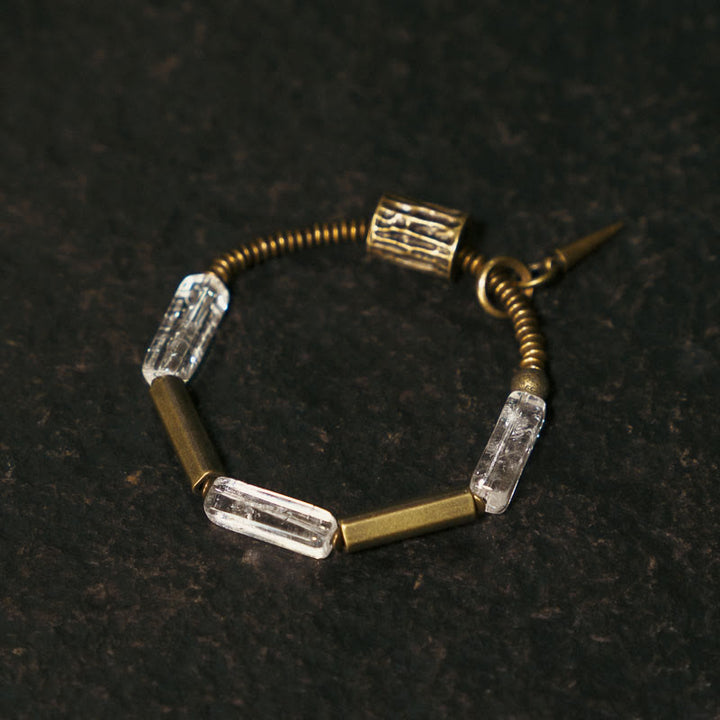 Bracelet porte-bonheur carré en cuivre et cristal blanc Buddha Stones