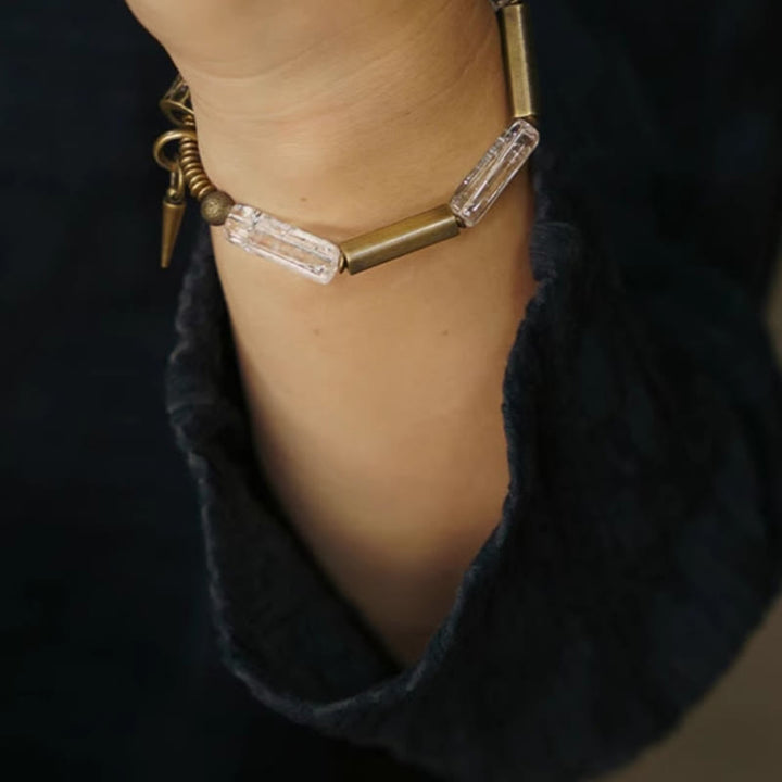 Bracelet porte-bonheur carré en cuivre et cristal blanc Buddha Stones