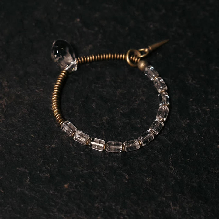 Bracelet porte-bonheur en cuivre et cristal blanc Buddha Stones