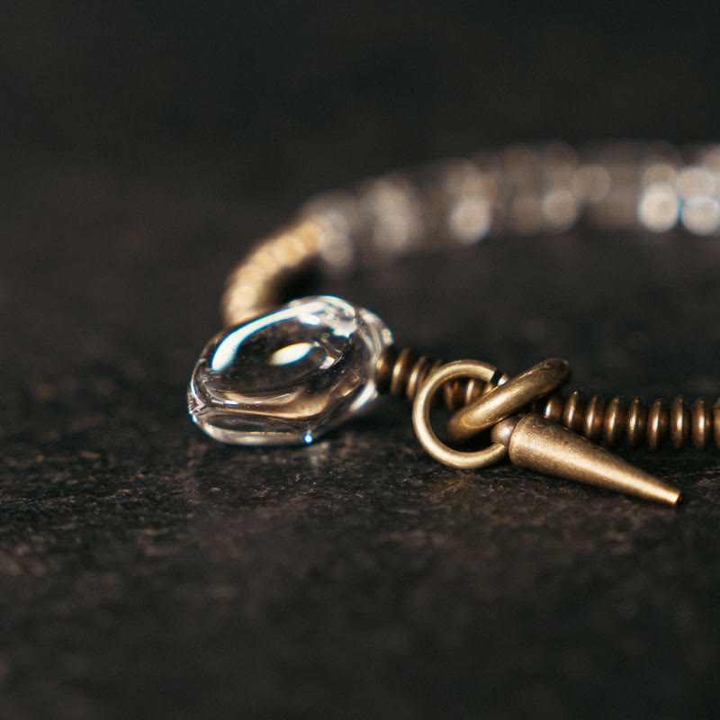 Bracelet porte-bonheur en cuivre et cristal blanc Buddha Stones