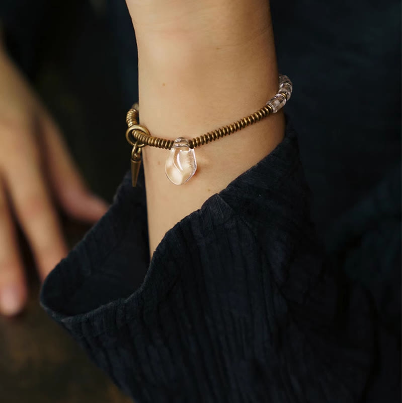 Bracelet porte-bonheur en cuivre et cristal blanc Buddha Stones
