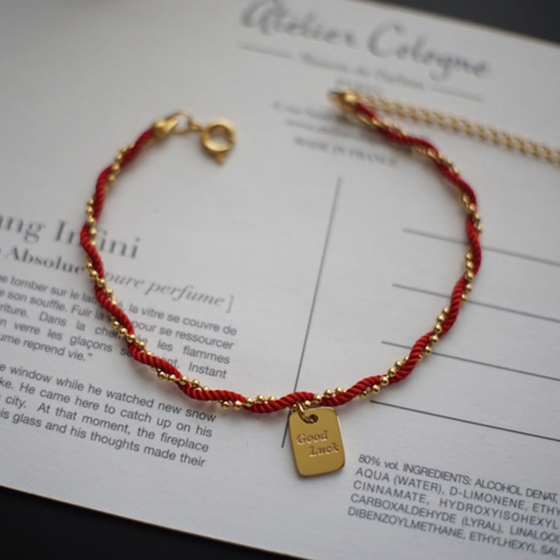 Bracelet porte-bonheur en cuivre plaqué or avec cordon rouge et Buddha Stones