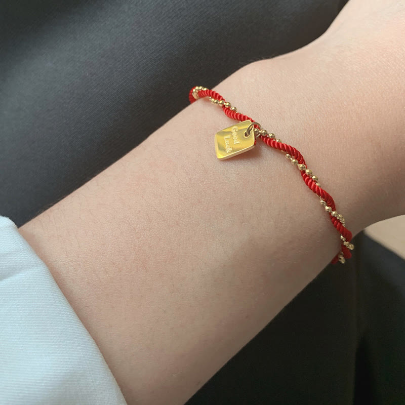 Bracelet porte-bonheur en cuivre plaqué or avec cordon rouge et Buddha Stones