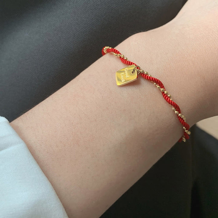 Bracelet porte-bonheur en cuivre plaqué or avec cordon rouge et Buddha Stones