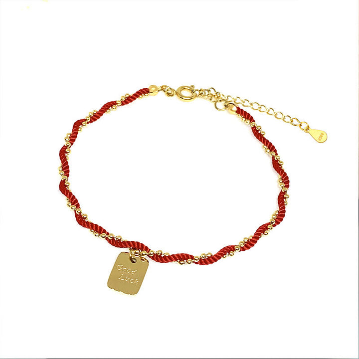 Bracelet porte-bonheur en cuivre plaqué or avec cordon rouge et Buddha Stones