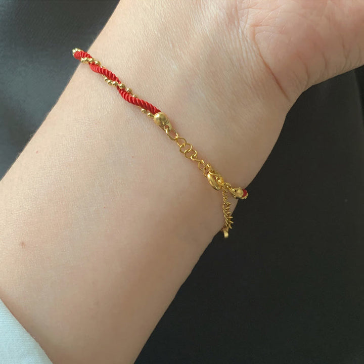 Bracelet porte-bonheur en cuivre plaqué or avec cordon rouge et Buddha Stones