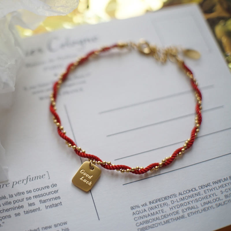 Bracelet porte-bonheur en cuivre plaqué or avec cordon rouge et Buddha Stones