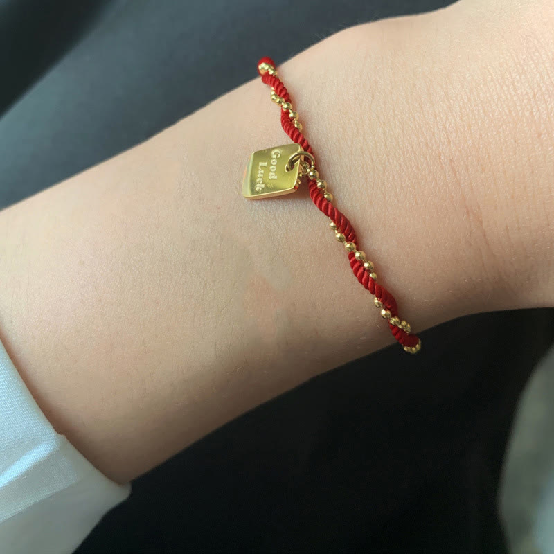 Bracelet porte-bonheur en cuivre plaqué or avec cordon rouge et Buddha Stones