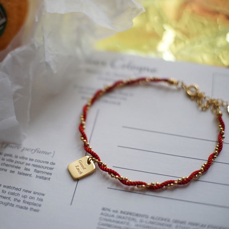 Bracelet porte-bonheur en cuivre plaqué or avec cordon rouge et Buddha Stones