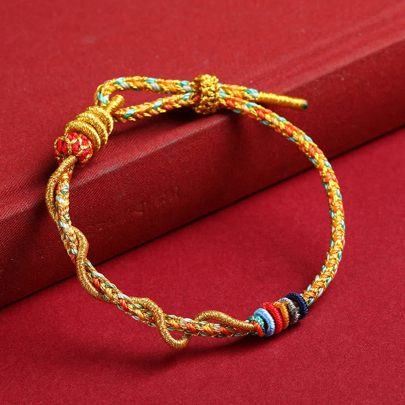 Bracelet tressé de protection de l'année du serpent avec cordon rouge et Buddha Stones