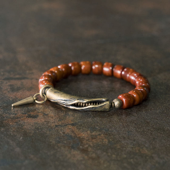 Bracelet de force avec pendentif cône en cuivre et perles en Buddha Stones