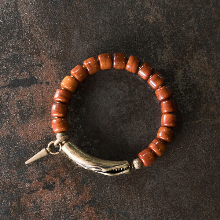 Bracelet de force avec pendentif cône en cuivre et perles en Buddha Stones