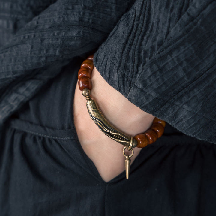 Bracelet de force avec pendentif cône en cuivre et perles en Buddha Stones