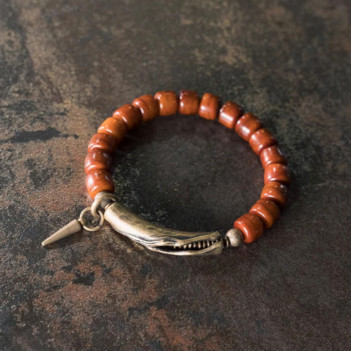 Bracelet de force avec pendentif cône en cuivre et perles en Buddha Stones