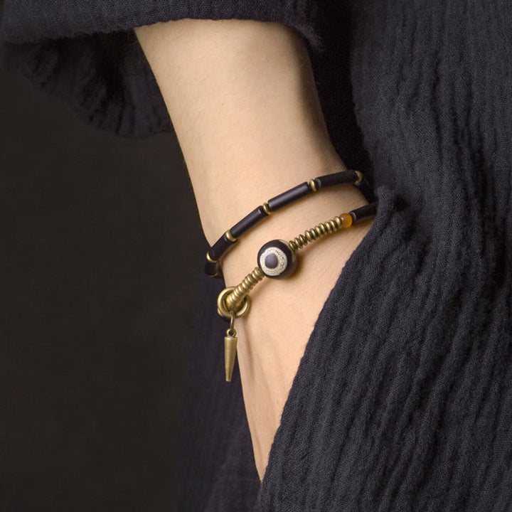 Bracelet de protection à double tour avec pendentif en forme de Buddha Stones en onyx noir et cuivre Dzi
