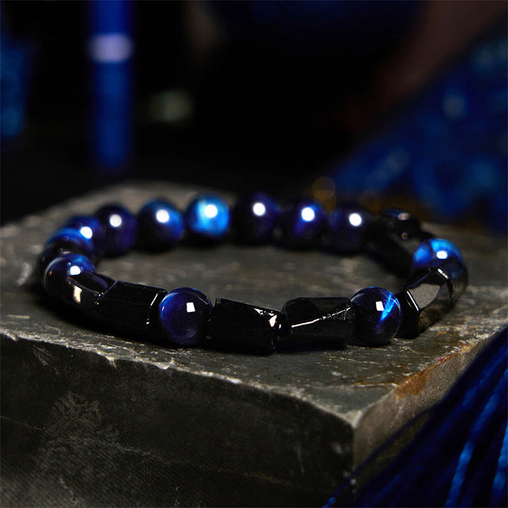 Bracelet de force en Buddha Stones, œil de tigre bleu et tourmaline noire