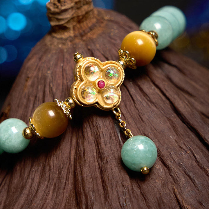 Bracelet de prospérité en jade et œil de tigre jaune Buddha Stones