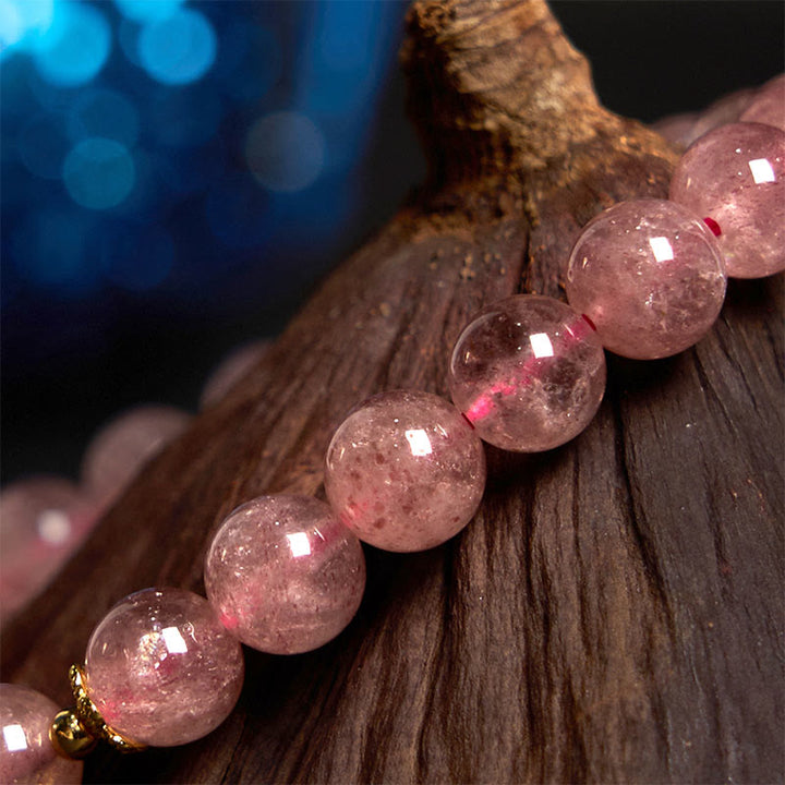 Bracelet de guérison et de positivité en quartz fraise naturel Buddha Stones