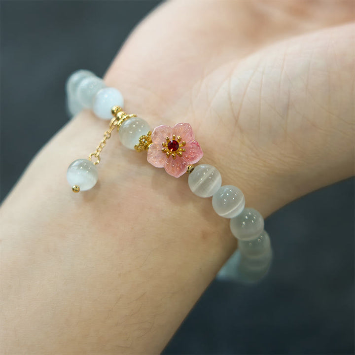 Bracelet de soutien en chrysobéryl œil de chat et fleurs roses de Buddha Stones