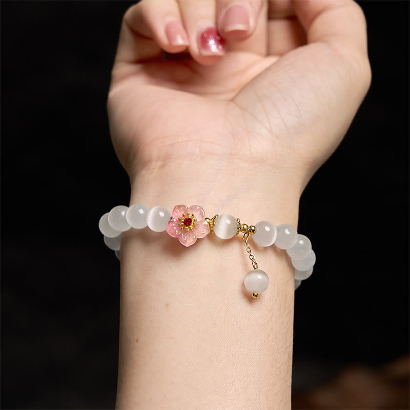 Bracelet de soutien en chrysobéryl œil de chat et fleurs roses de Buddha Stones