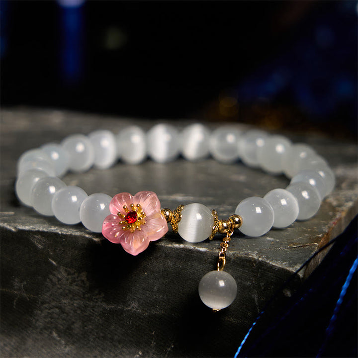 Bracelet de soutien en chrysobéryl œil de chat et fleurs roses de Buddha Stones