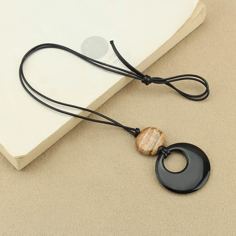 Collier pendentif en cuivre avec pierre d'image Liuli en obsidienne noire et Buddha Stones