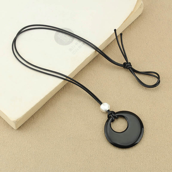 Collier pendentif en cuivre avec pierre d'image Liuli en obsidienne noire et Buddha Stones