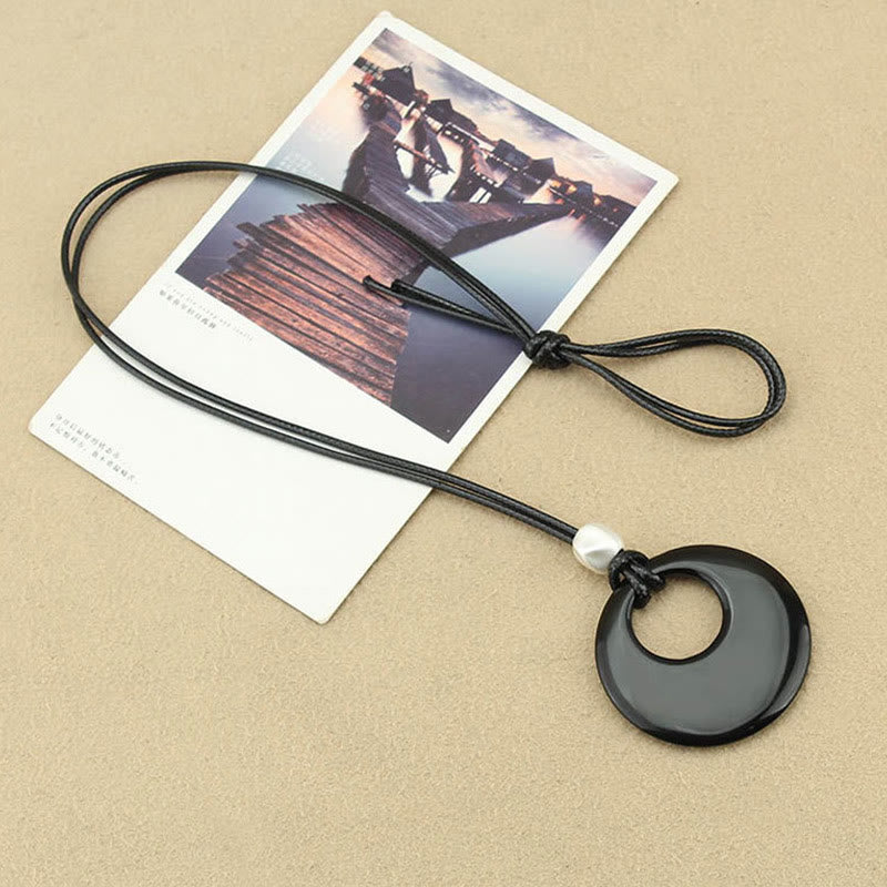 Collier pendentif en cuivre avec pierre d'image Liuli en obsidienne noire et Buddha Stones