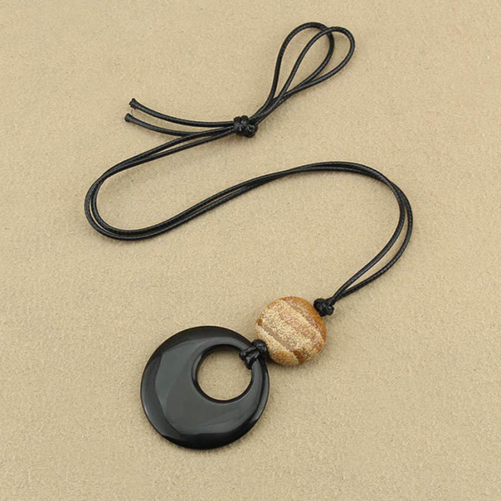 Collier pendentif en cuivre avec pierre d'image Liuli en obsidienne noire et Buddha Stones