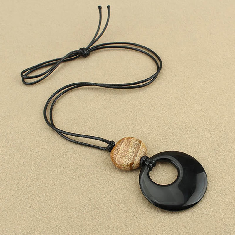 Collier pendentif en cuivre avec pierre d'image Liuli en obsidienne noire et Buddha Stones