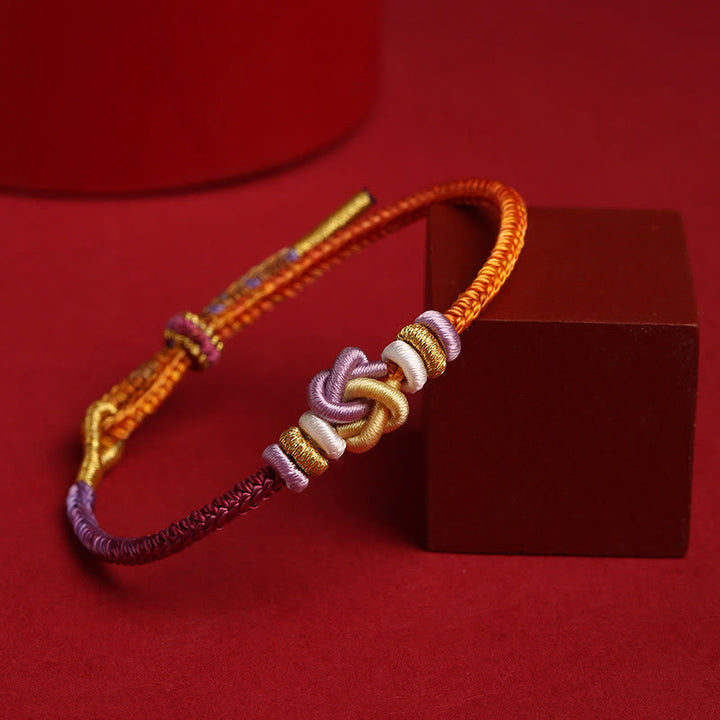 Bracelet tressé de protection en forme de cœur avec Buddha Stones colorées