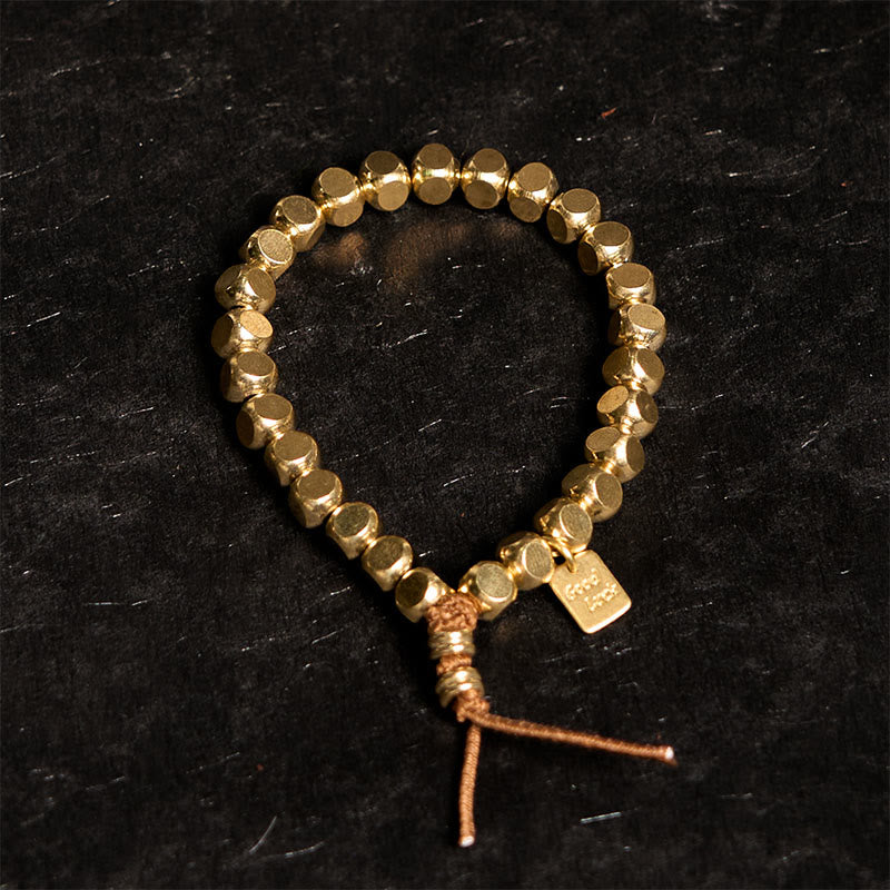 Bracelet porte-bonheur en Buddha Stones , laiton et cuivre, pour prendre soin de soi - image 1