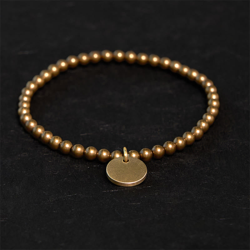 Bracelet d'équilibre en laiton et cuivre Amekaji avec Buddha Stones - Laiton (Tour de poignet : 20-21 cm) - image 0