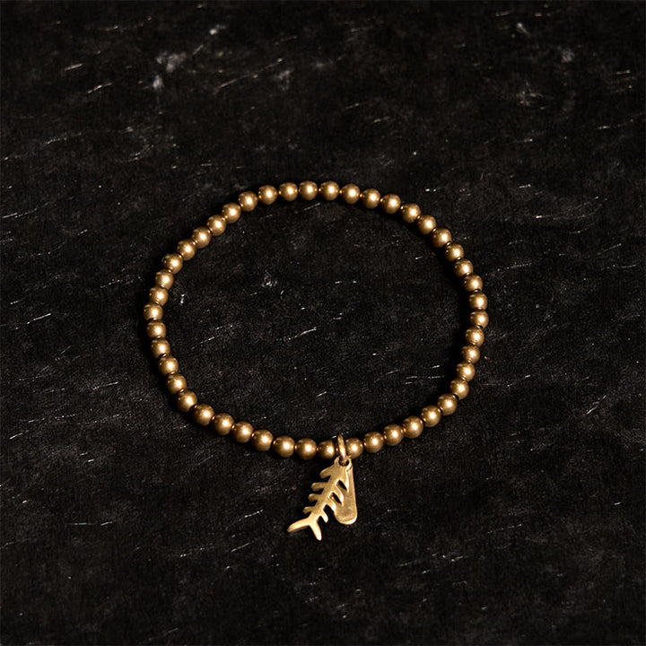 Bracelet de guérison en Buddha Stones, laiton et cuivre, en arêtes de poisson - image 1