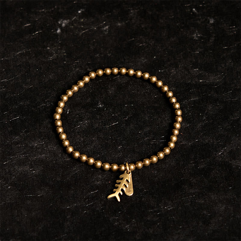 Bracelet de guérison en arête de poisson en cuivre et Buddha Stones