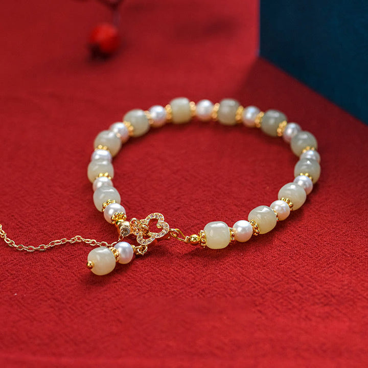 Bracelet d'abondance avec pendentif en trèfle à quatre feuilles en alliage de perles de jade Hetian et Buddha Stones