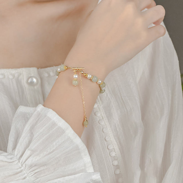 Bracelet d'abondance avec pendentif en trèfle à quatre feuilles en alliage de perles de jade Hetian et Buddha Stones