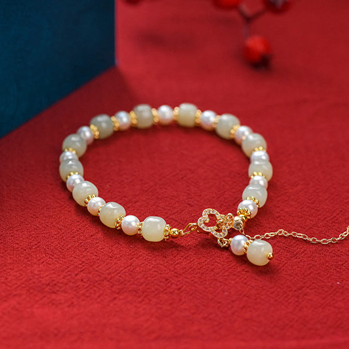 Bracelet d'abondance avec pendentif en trèfle à quatre feuilles en alliage de perles de jade Hetian et Buddha Stones
