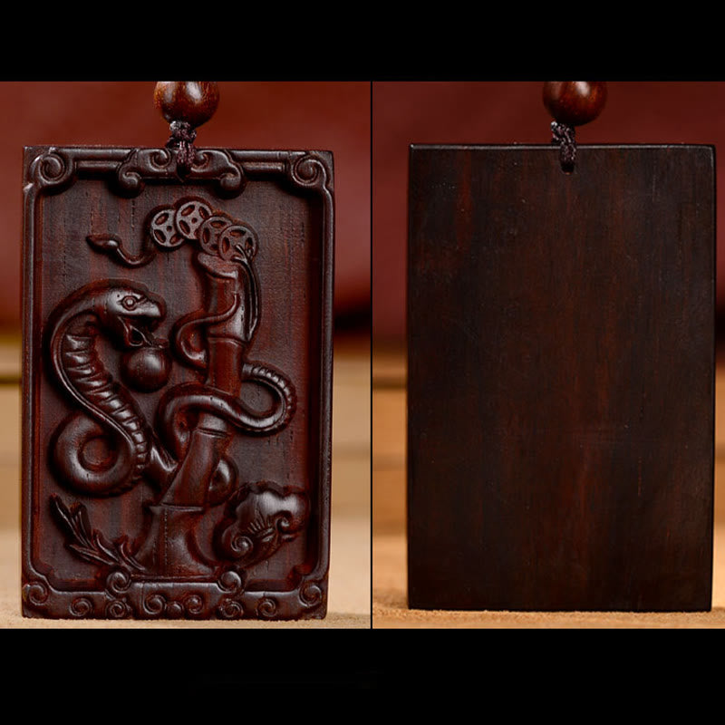Collier pendentif calme en bois de santal rouge avec petites feuilles du zodiaque chinois Buddha Stones