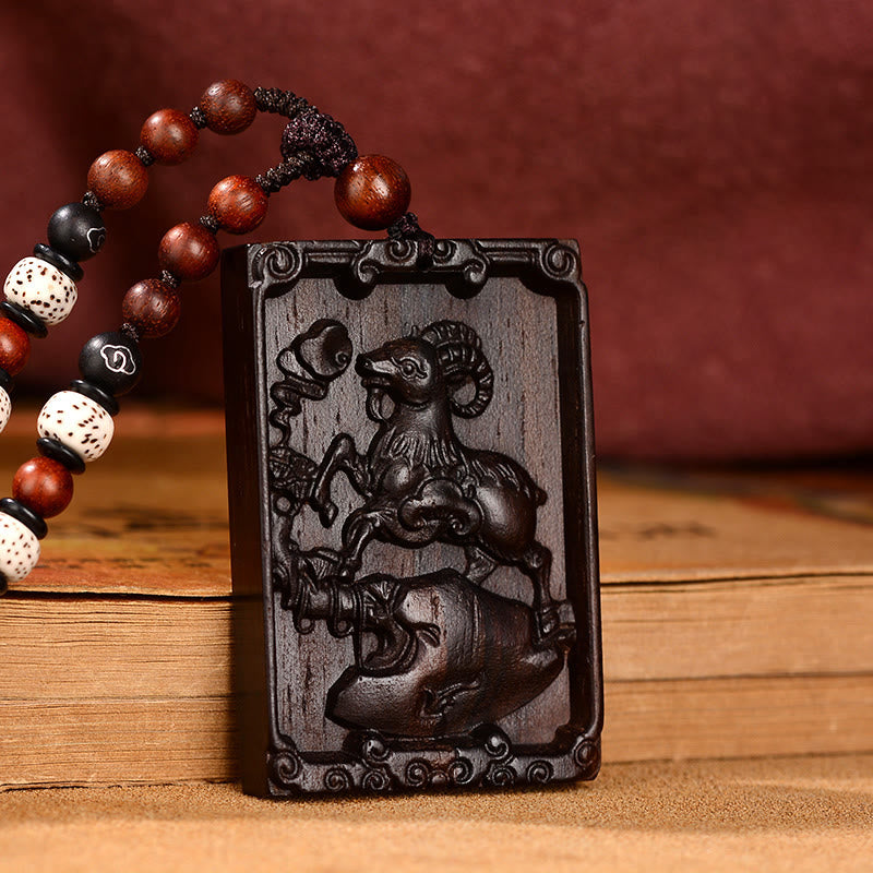 Collier pendentif calme en bois de santal rouge avec petites feuilles du zodiaque chinois Buddha Stones