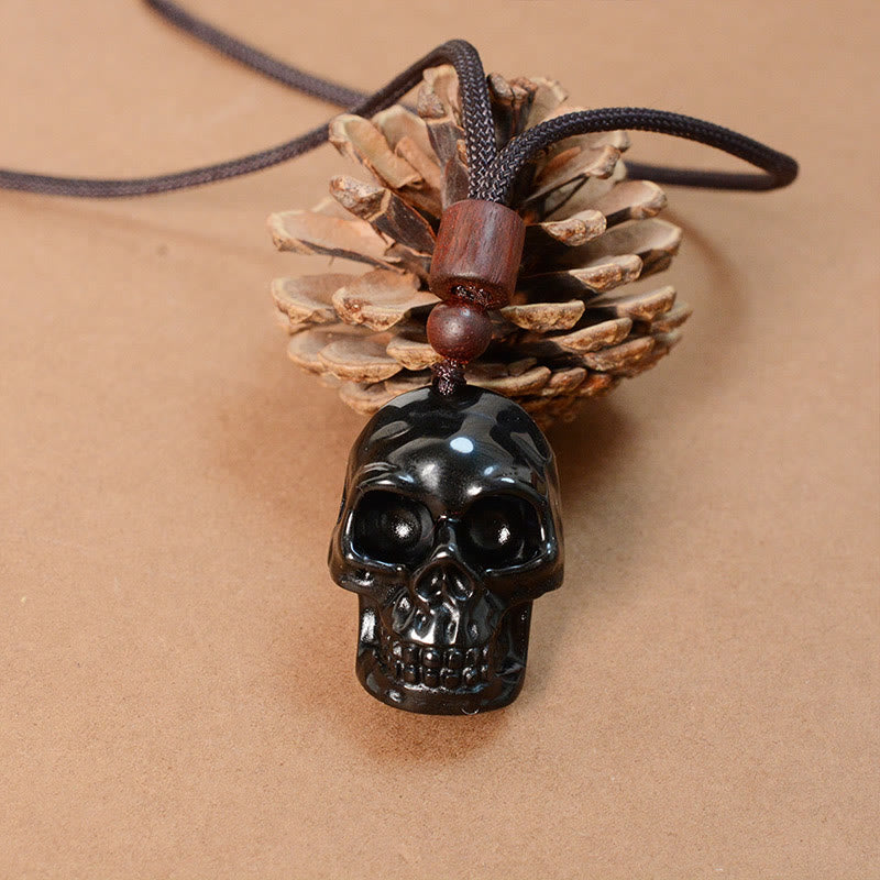 Collier pendentif en obsidienne noire avec Buddha Stones et squelette Shmashana