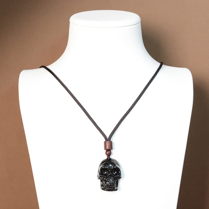 Collier pendentif en obsidienne noire avec Buddha Stones et squelette Shmashana