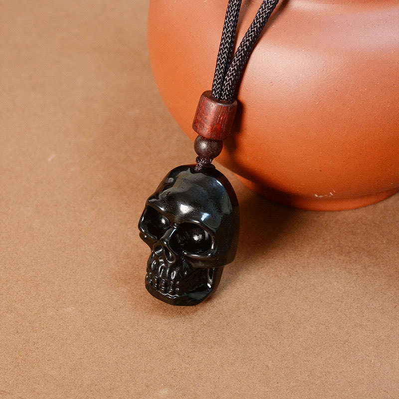Collier pendentif en obsidienne noire avec Buddha Stones et squelette Shmashana