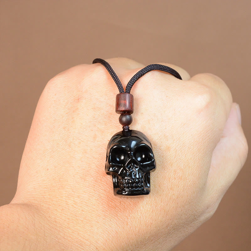 Collier pendentif en obsidienne noire avec Buddha Stones et squelette Shmashana