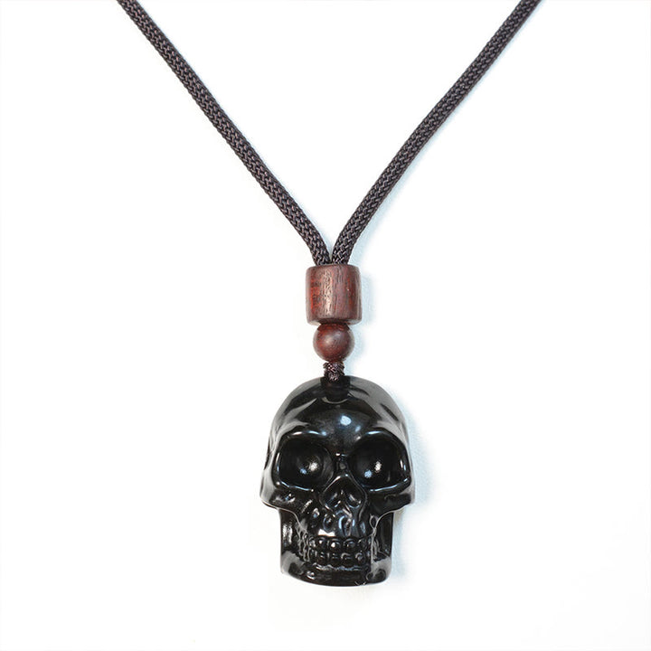 Collier pendentif en obsidienne noire avec Buddha Stones et squelette Shmashana