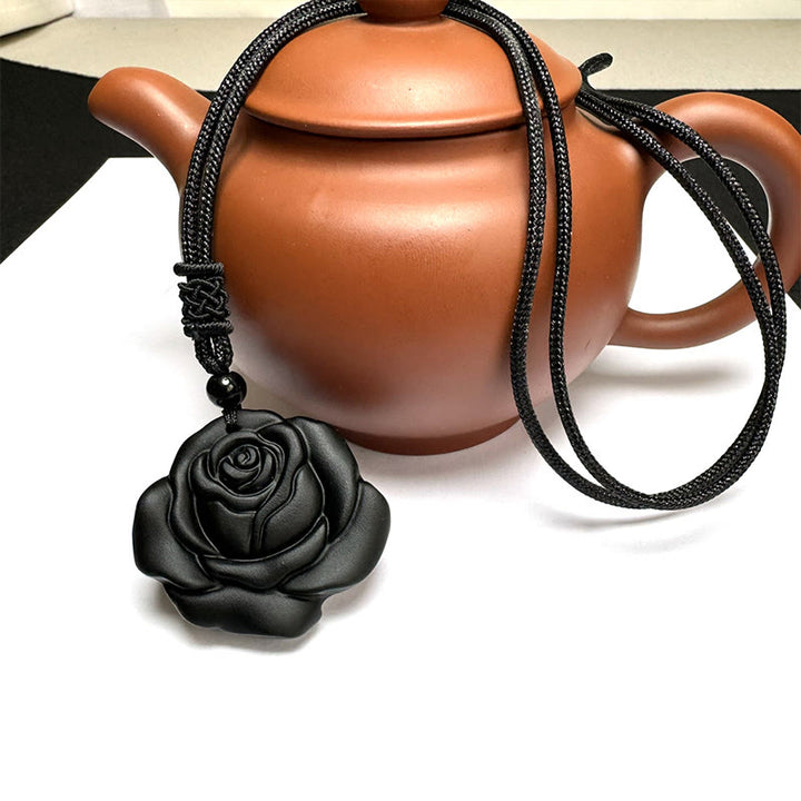 Collier avec pendentif de purification en obsidienne noire et Buddha Stones