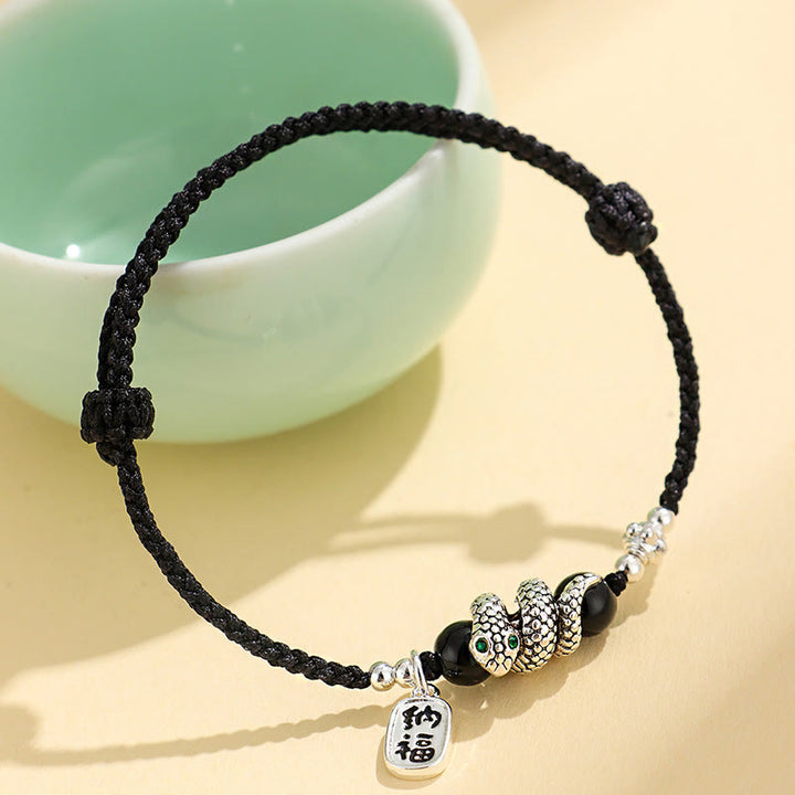 Bracelet porte-bonheur en fil rouge avec Buddha Stones et caractère Fu Année du serpent