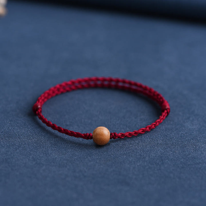 Bracelet tressé en perles de bois de pêche naturel Buddha Stones pour éloigner les mauvais esprits