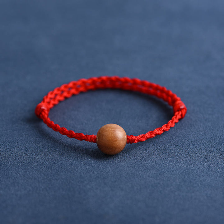 Bracelet tressé en perles de bois de pêche naturel Buddha Stones pour éloigner les mauvais esprits