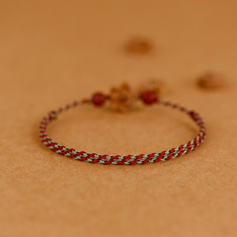 Bracelet de cheville en bois de pêcher et petites fleurs de pêcher en cinabre avec Buddha Stones